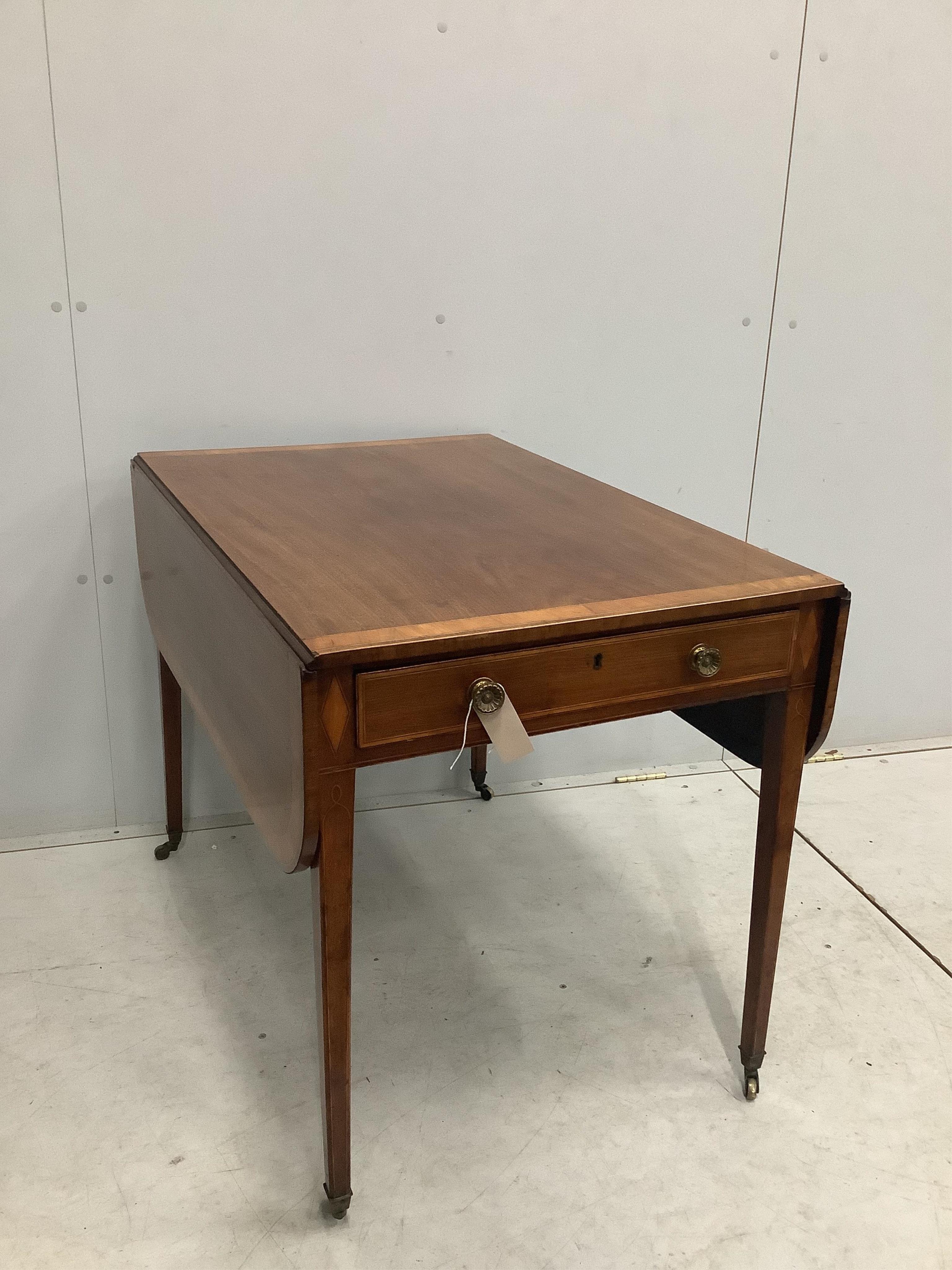 A George III satinwood banded mahogany Pembroke table, width 91cm, depth 62cm, height 70cm. Condition - fair